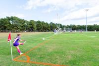 Vineyard player takes a corner kick.
