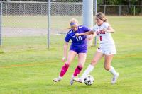 Eleanor Mone battling a defender.
