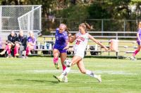 Reese Malowski sneaks it by the defender.