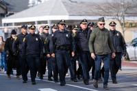 Island police officers join the parade.