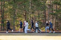 Track hopefuls make their way around.