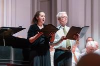 Becky Williams and David Behnke stand for their solos.