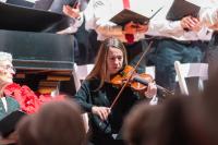 Rebecca Laird provided accompaniment on violin.