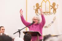 Rabbi Caryn Broitman leads the song.