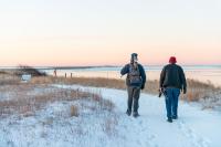 Robert Culbert and John Clark walk out to Long Point.