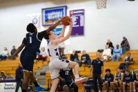 A contested shot from Taurus Biskis.