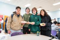 Raphael Aviles, Hunter Bolduck, Brady Vougt and Heidi Turner are happy customers.