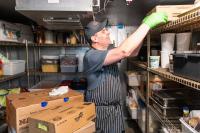 Marc Brasefield (food services manager) in the walk-in.